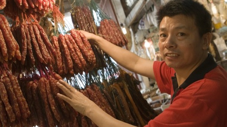 Worker in Chinese butchers