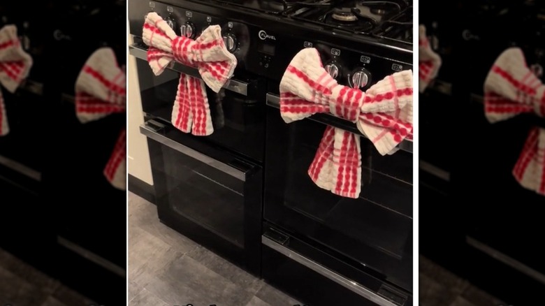 Kitchen towel bow on a black oven