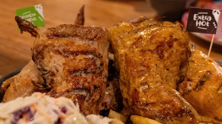 Nando's chicken closeup served extra hot