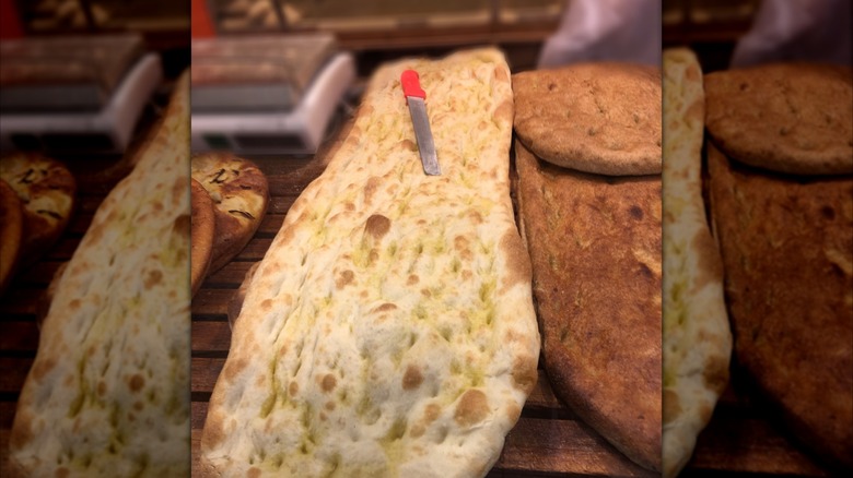 Freshly-baked pizza bianca