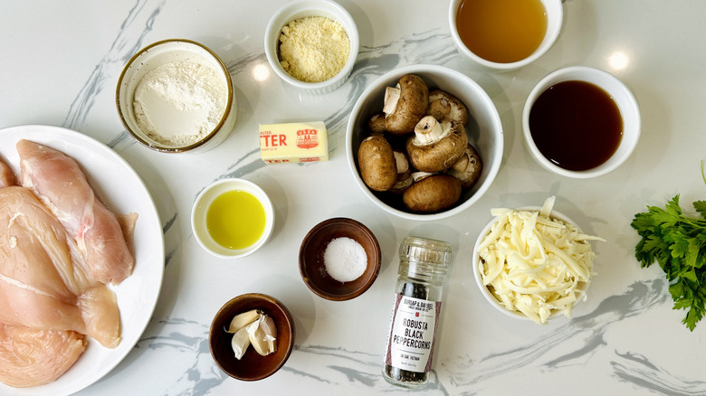 chicken, cheese, and mushrooms with assorted seasonings and liquids
