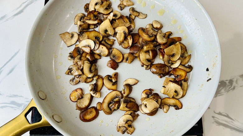cooked mushrooms in a frying pan