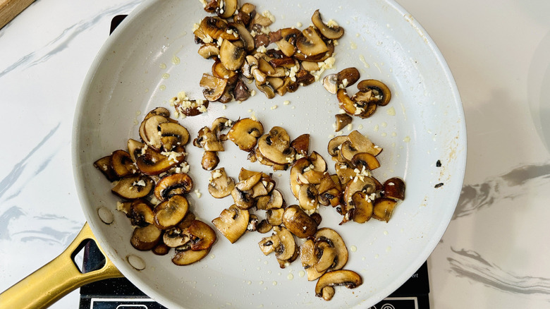 cooked mushrooms in a frying pan