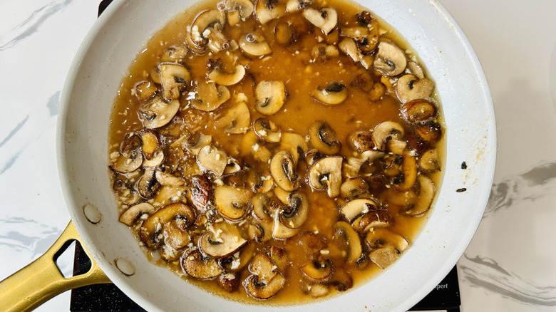mushroom sauce in a frying pan