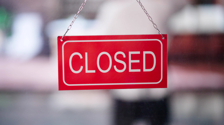 Closed sign in a restaurant window