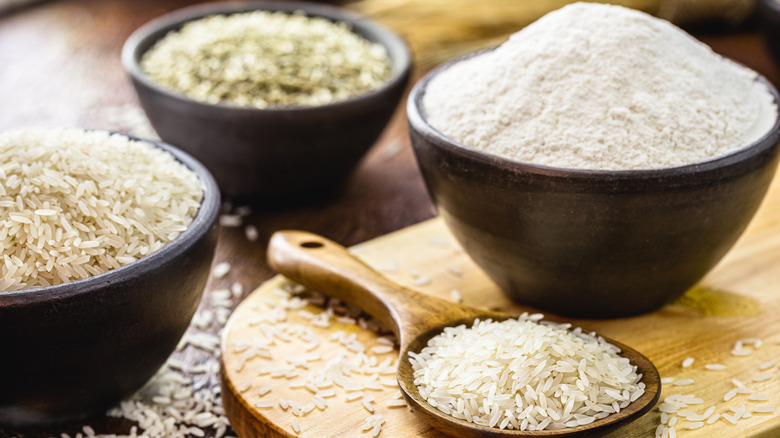 Bowls and spoon containing rice