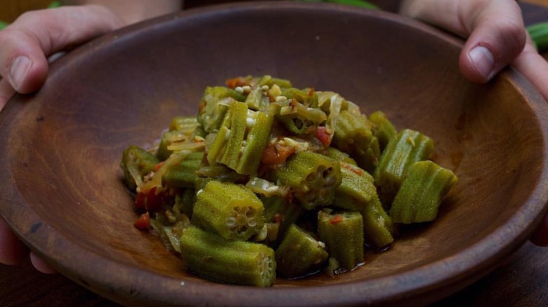 okra in a wooden bowl
