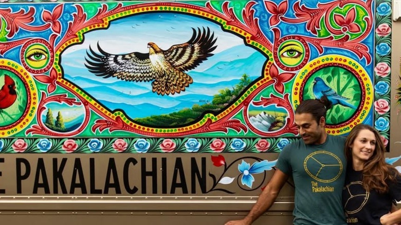 couple in front of pakalachian truck