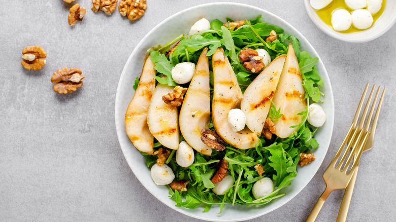 grilled pear salad with walnuts and cheese