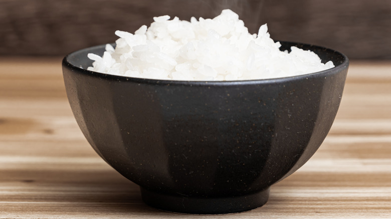 Bowl of rice with steam