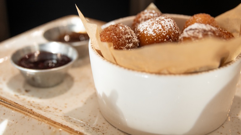 Donut holes with chocolate sauce dip