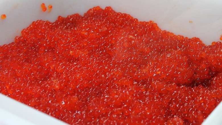 container of red tobiko