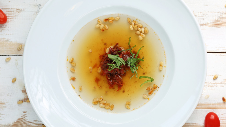 tomato water with pine nuts