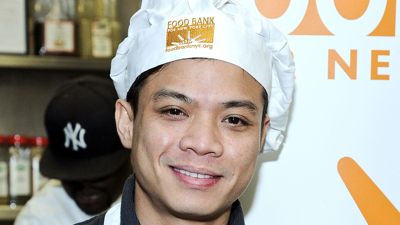 Chef Hung Huynh smiling in hat