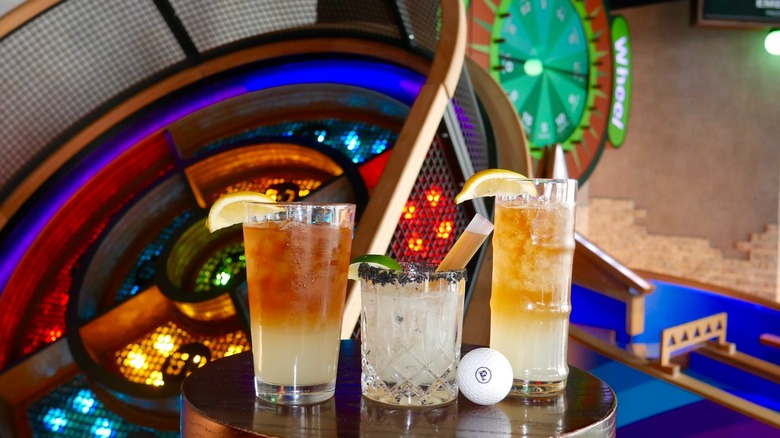 Puttshack cocktails with a mini golf ball