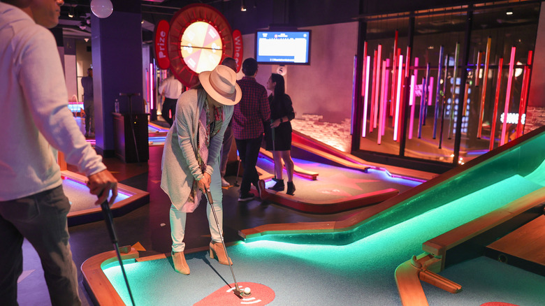 neon-lit mini golf course at Puttshack