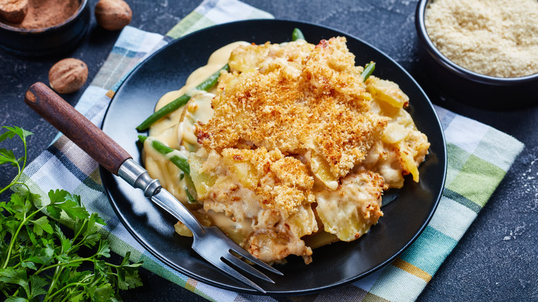 Plate of scalloped potatoes with chips