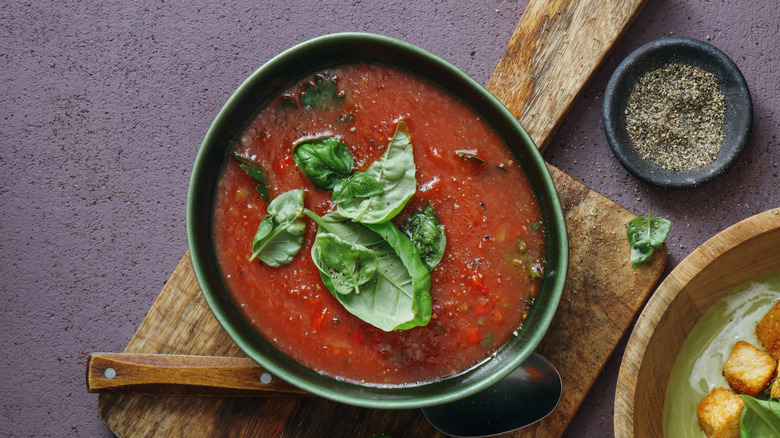 Bowl of tomato soup with spinach
