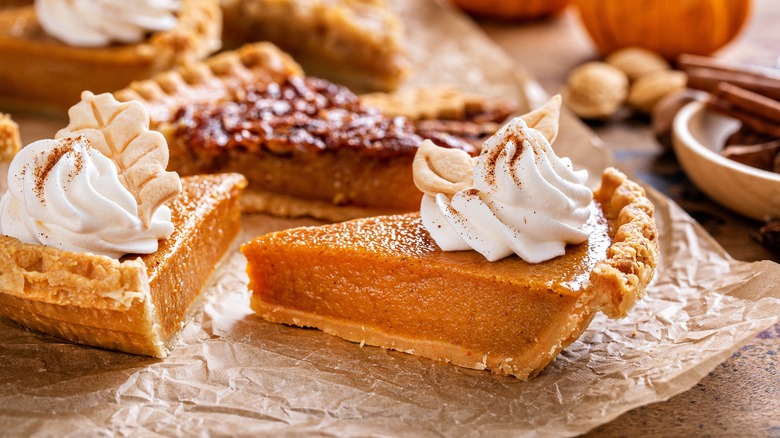 Pumpkin pie topped with spiced whipped cream