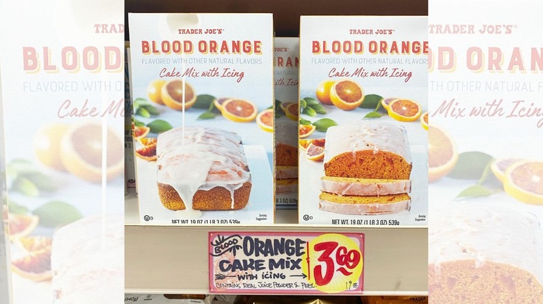 Two boxed of Trader Joe's Blood Orange Cake Mix with Icing on a shelf at the store