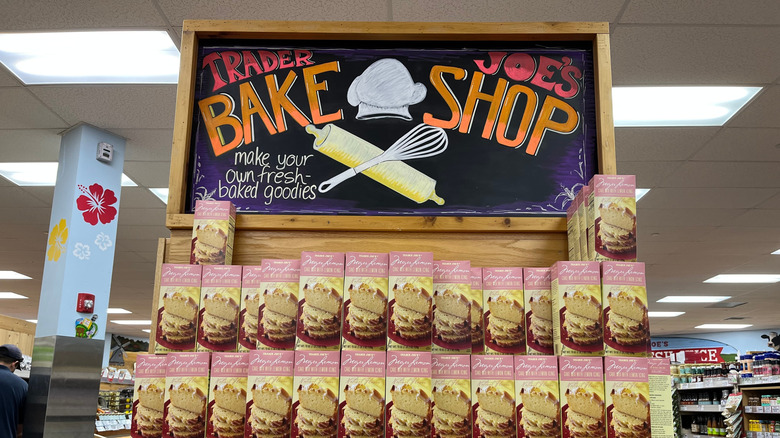 A display of Trader Joe's Meyer Lemon Cake Shop boxes underneath a sign that says "Bake Shop"
