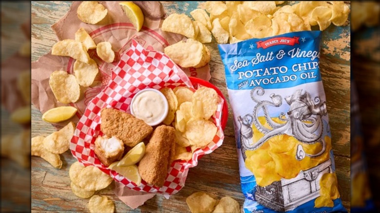 Trader Joe's sea salt and vinegar potato chips with avocado oil with basket of fish
