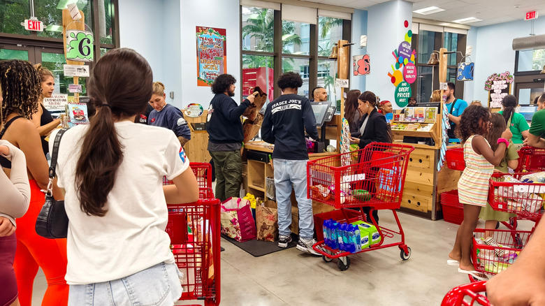 crowded checkout lines at a Trader Joe's