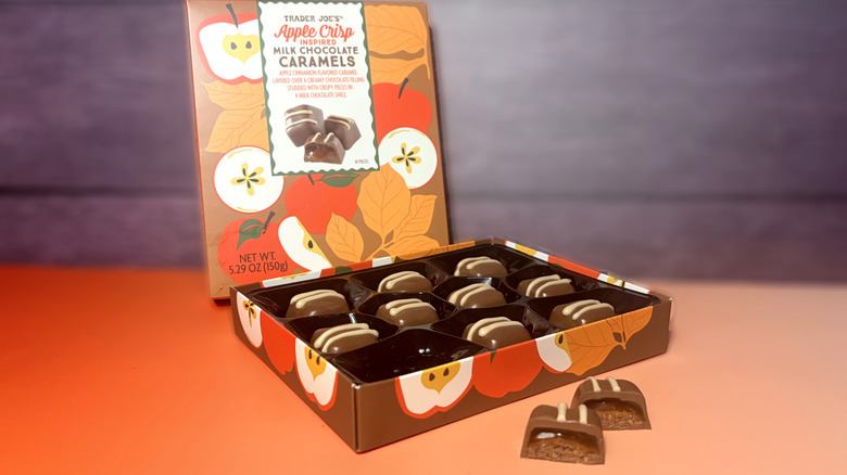 opened package of trader joes apple crisp chocolate caramels with one sliced in half