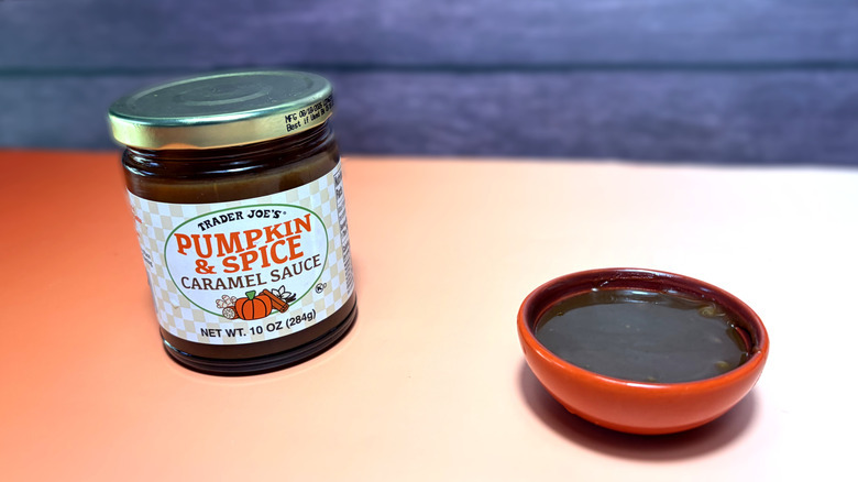 bowl and jar of trader joes pumpkin and spice caramel sauce