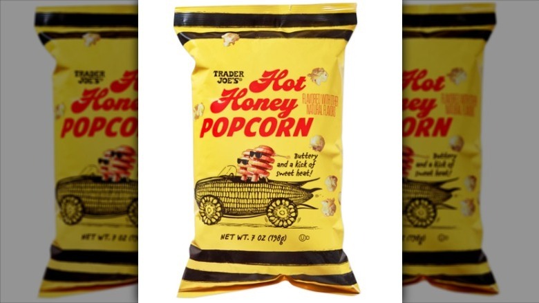 Hot honey popcorn on white background