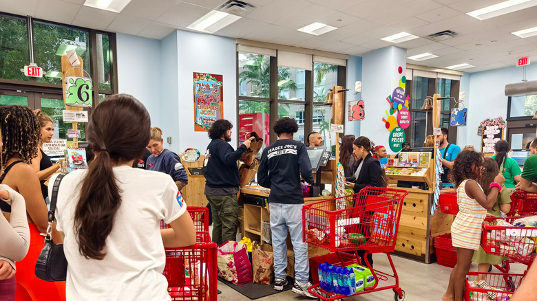 Customers and crew members at Trader Joe's checkout