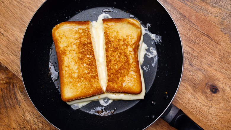 Grilled cheese cooking in a pan
