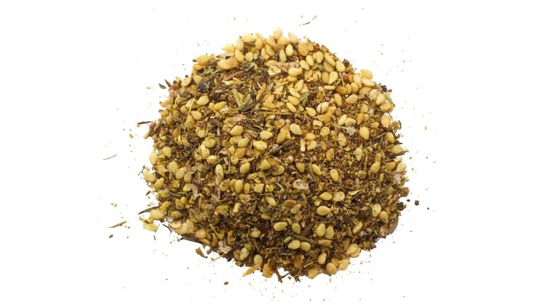 A pile of za'atar on a white background