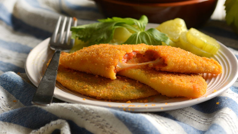 Hot Pocket-style savory pastries on plate with fork