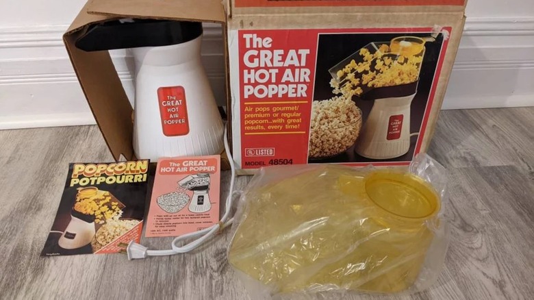 The Great Hot Air Popper with its box, manual, and top attachment