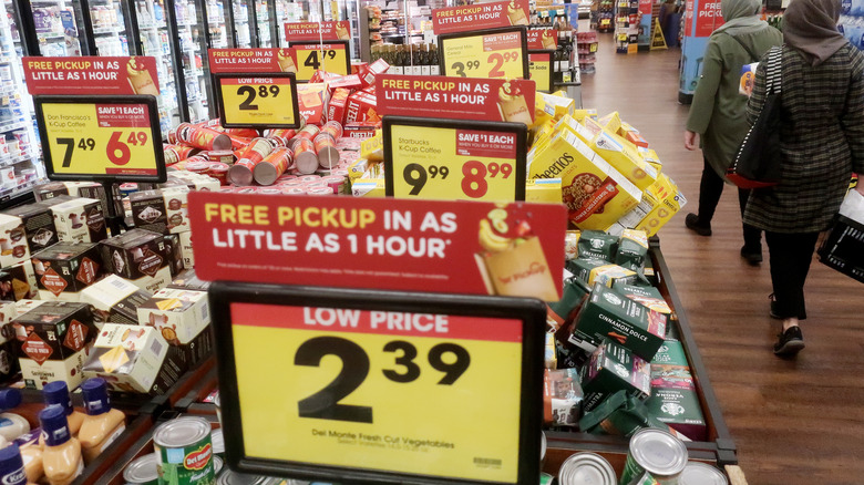 Sales signs at grocery store