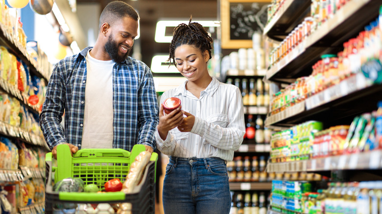 Couple grocery shopping