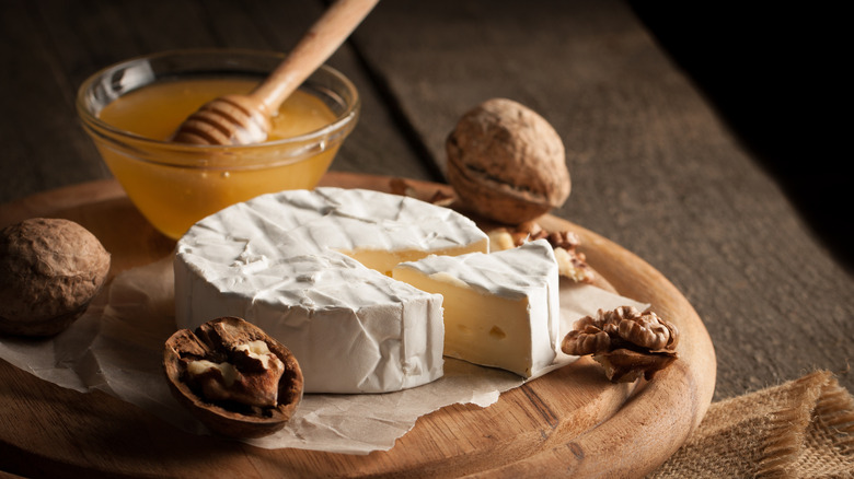 round of brie with walnuts