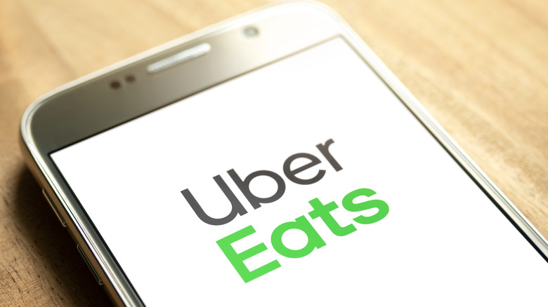 Uber Eats logo displayed on a phone