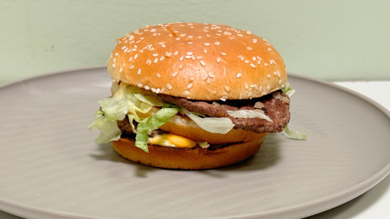 A McDonald's Big Mac up close on a plate