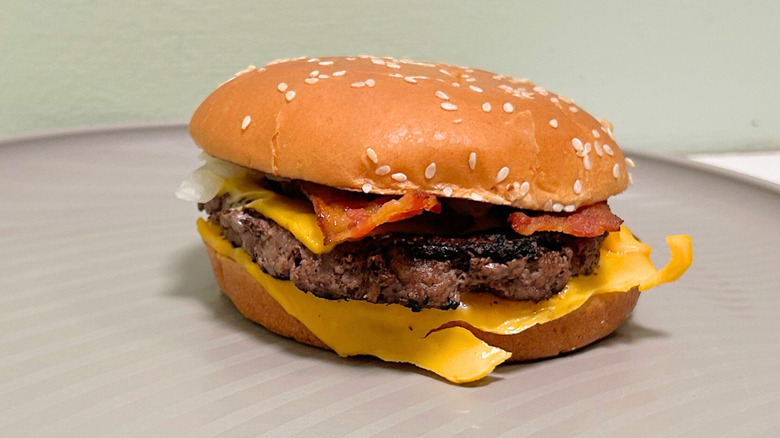 A McDonald's Bacon Quarter Pounder with Cheese up close