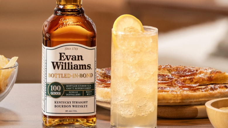 A bottle of Evan Williams white label bourbon with cocktail