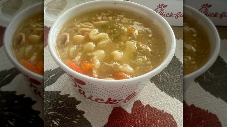 A bowl full of chicken noodle soup from Chick-fil-A