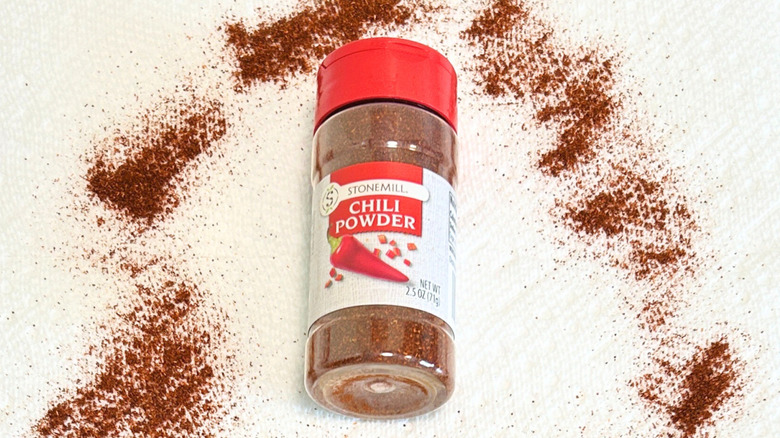 A bottle of Stonemill Chili Powder amonst chili powder