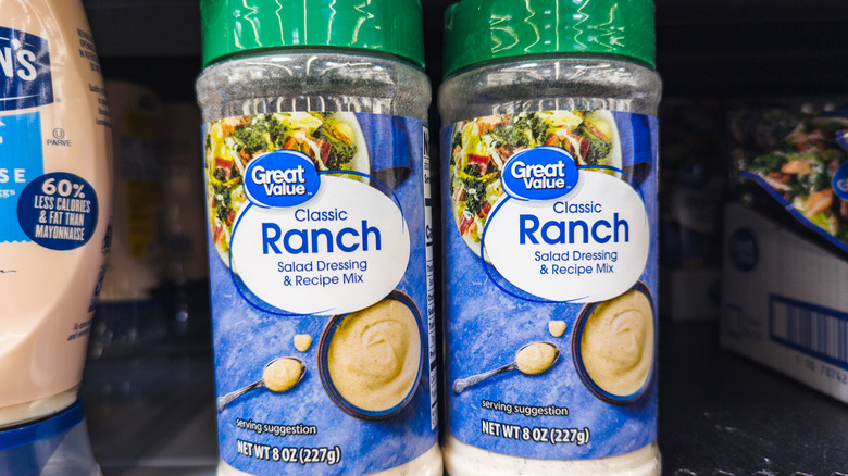 Close up of two containers of Great Value Classic Ranch Salad Dressing and Recipe Mix