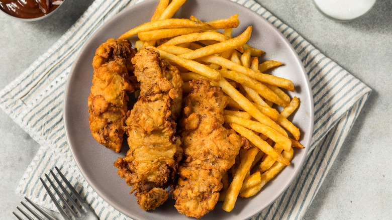 Finger steaks, battered and deep fried, with French fries