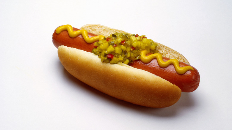 Hot dog with mustard and relish