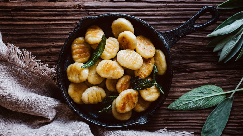 crispy gnocchi with sage in a pan