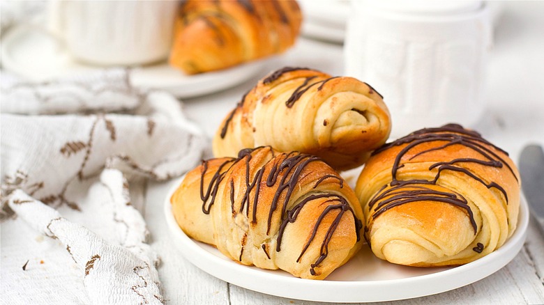 Croissants drizzled in chocolate 