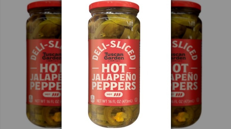 Tusan Garden deli-sliced jalapenos on white background